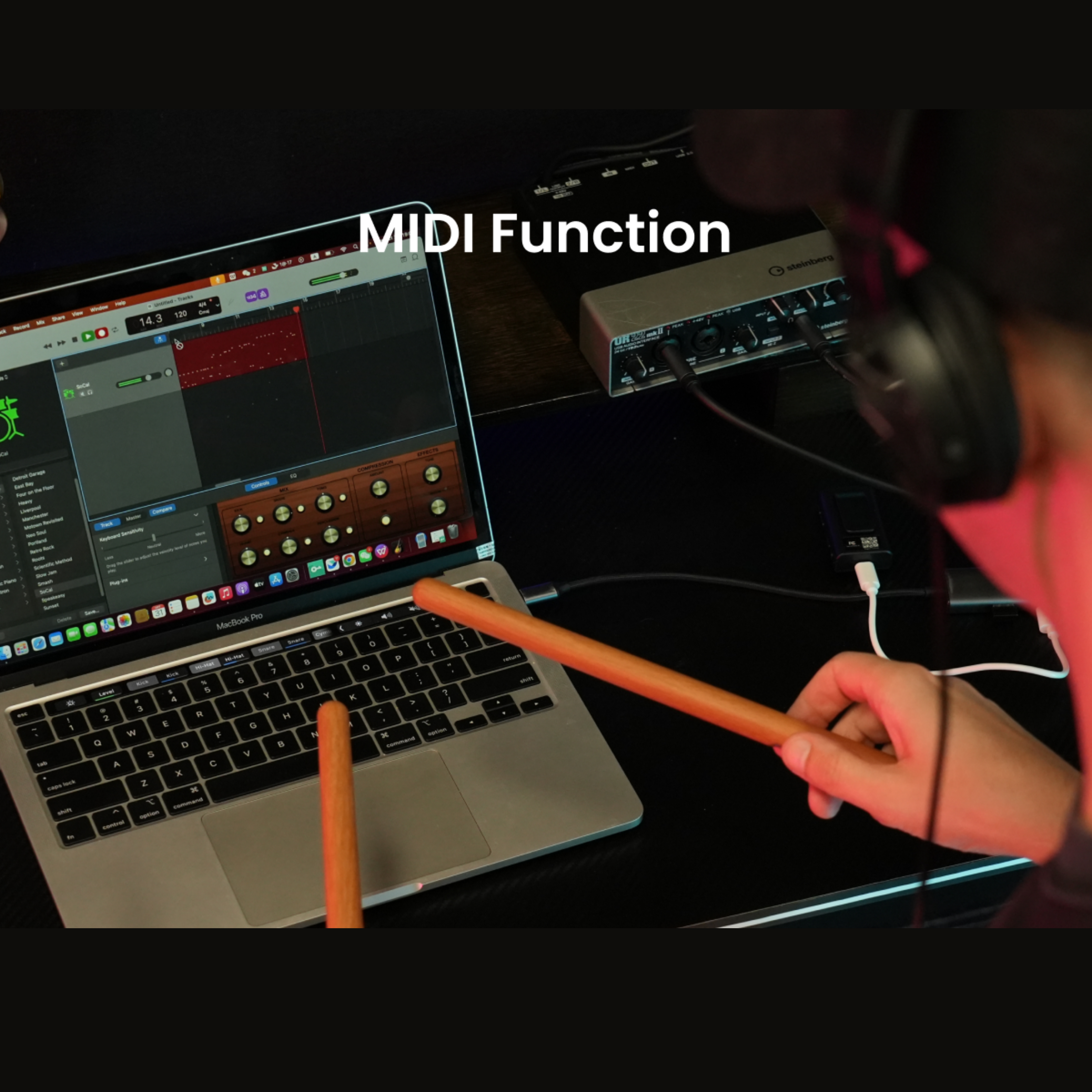 AeroBand PocketDrum 2 Max connected to a laptop for MIDI music production